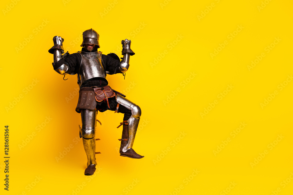 Naklejka premium Dynamic knight in shining armor posing energetically against a vibrant yellow background