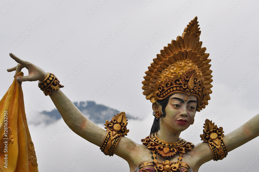 A colorful statue beautifully showcasing traditional dance attire in Ulun Danu Beratan Temple