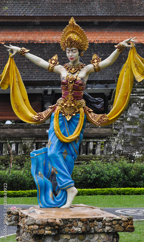 A colorful statue beautifully showcasing traditional dance attire in Ulun Danu Beratan Temple