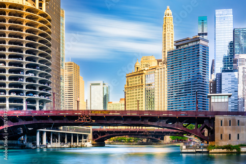 Obraz na płótnie Long exposure view of Chicago, Illinois skyline in front of the Dearborn street and State street bridges. Chicago is the most populous city in the U.S. state of Illinois and in the Midwestern USA w salonie
