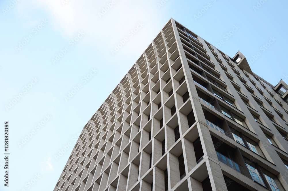 Modern Architectural Facade with Geometric Square Grid Design on a Contemporary Building in a Center of London. Modern Architectural Facade with Geometric Square Grid Design on a Contemporary Building in a Center of London.