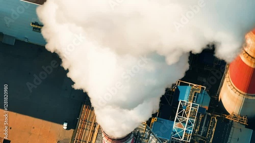 Coal power plant emits thick smoke, contributing to air pollution during peak operation hours