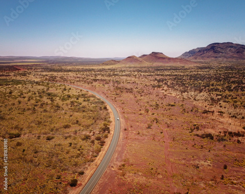 aerial drone view of desert road and mountains  in Karijini, Western Australia