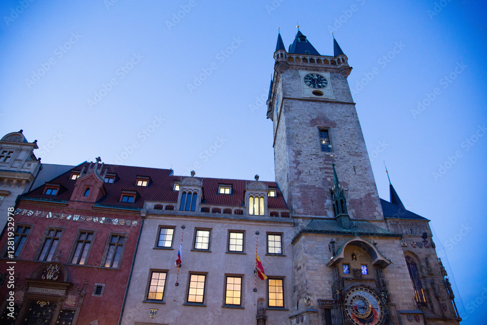 medieval castle located in the center of the modern and bustling city of Prague at night.