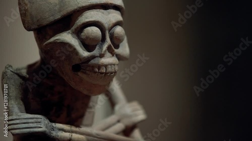 Olmec clay sculpture, depicting death symbols and sacred images of the Mesoamerican civilization.