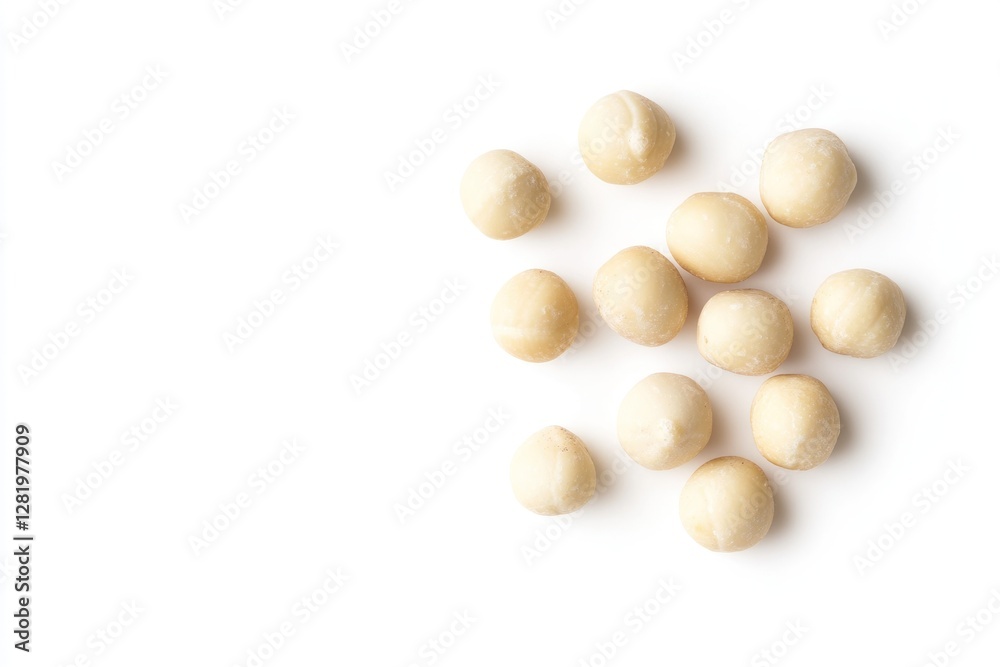 Scattered Macadamia Nuts Isolated On White Background Scattered Macadamia Nuts Isolated On White Background