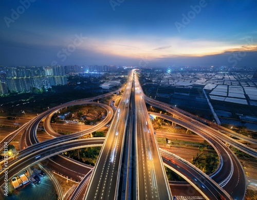 expressway top view road traffic an important infrastructure aerial view cityscape of advanced innovation financial technology car traffic transportation above intersection road in city night