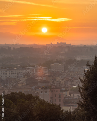 Vibrant sunrise over the city of Rome seen from the Terrazza del Gianicolo and Piazzale Giuseppe Garibaldi. Cityscape of the Capital of Italy