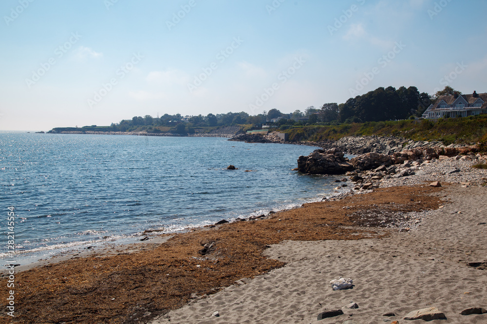 Rocky beach at the Cliff walk at the shore of the Easton bay in Newport, Rhode Island, USA