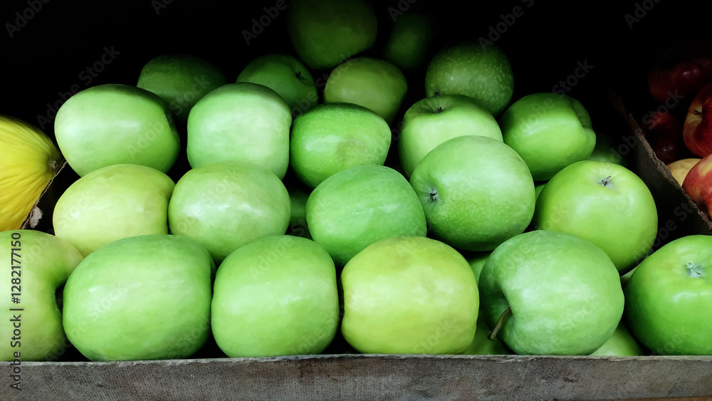 Fresh unripe green apples as background. Fresh unripe green apples as background.