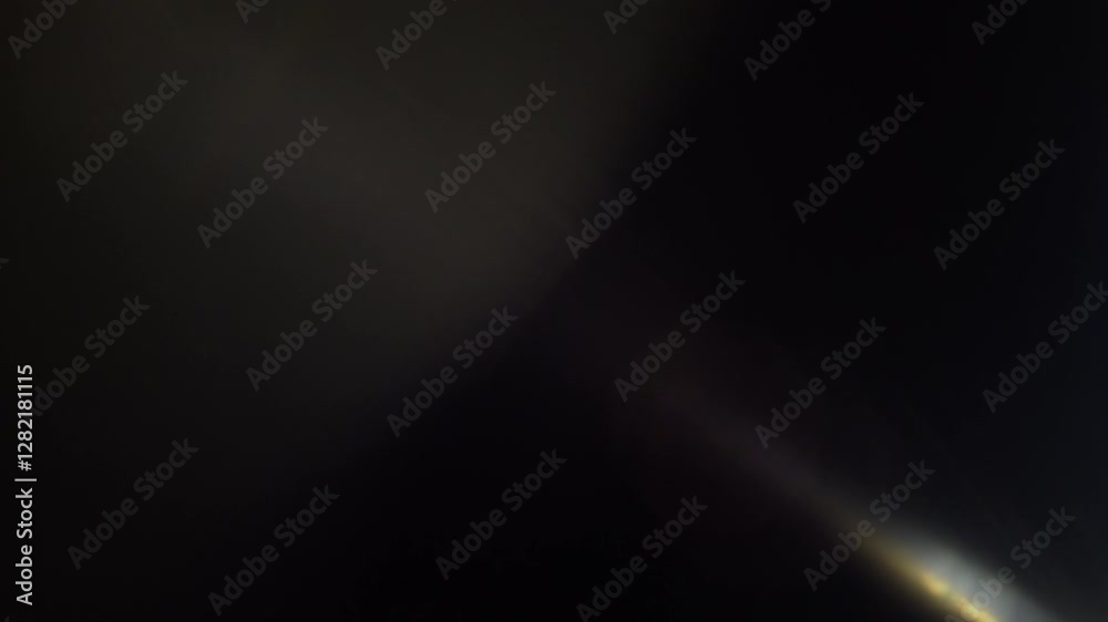 Diagonal Multi Optical Lens Flare Transition. Vibrant optical lens flares with light leaks and glow patterns. Naturally captured on black background.