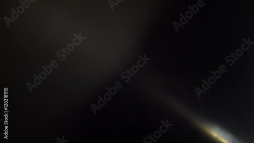 Diagonal Multi Optical Lens Flare Transition. Vibrant optical lens flares with light leaks and glow patterns. Naturally captured on black background.