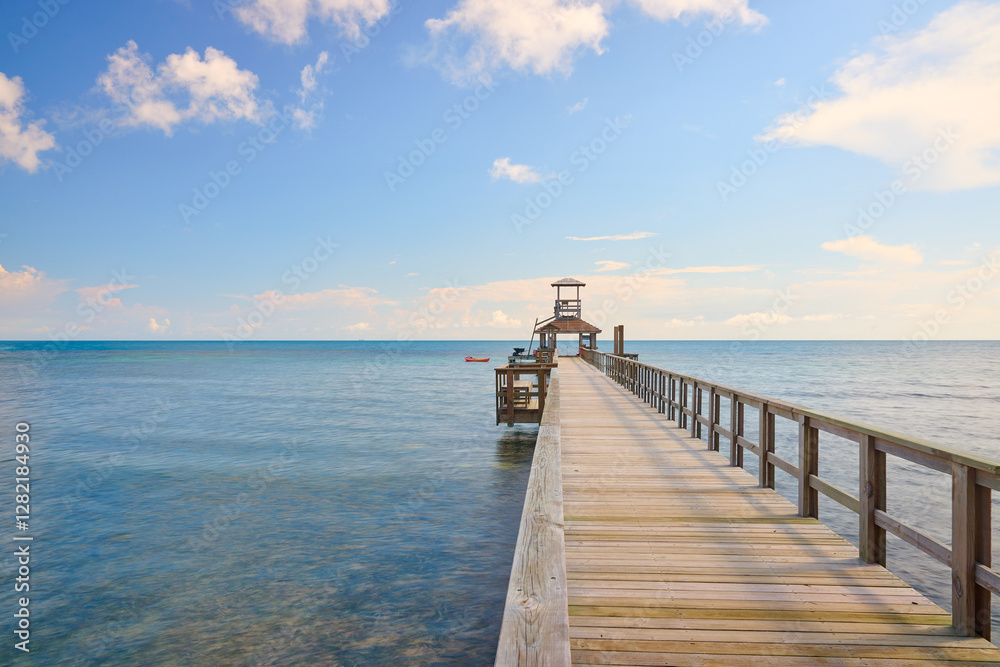 Wooden Dock in the Bay at Roatan, Honduras Wooden Dock in the Bay at Roatan, Honduras