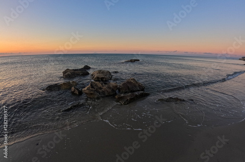Fototapeta Naklejka Na Ścianę i Meble -  Winter sunset over the Mediterranean seen from the Sicilian coast