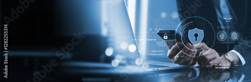 Cyber security network. Data protection concept. Businessman using laptop computer and mobile phone with padlock on network security technology with cloud computing, data management, cybersecurity