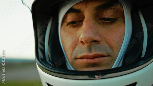 Astronaut With Helmet Pensive On The Continuation Of The Space Mission