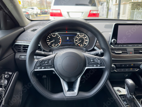 Car interior in traffic photo
