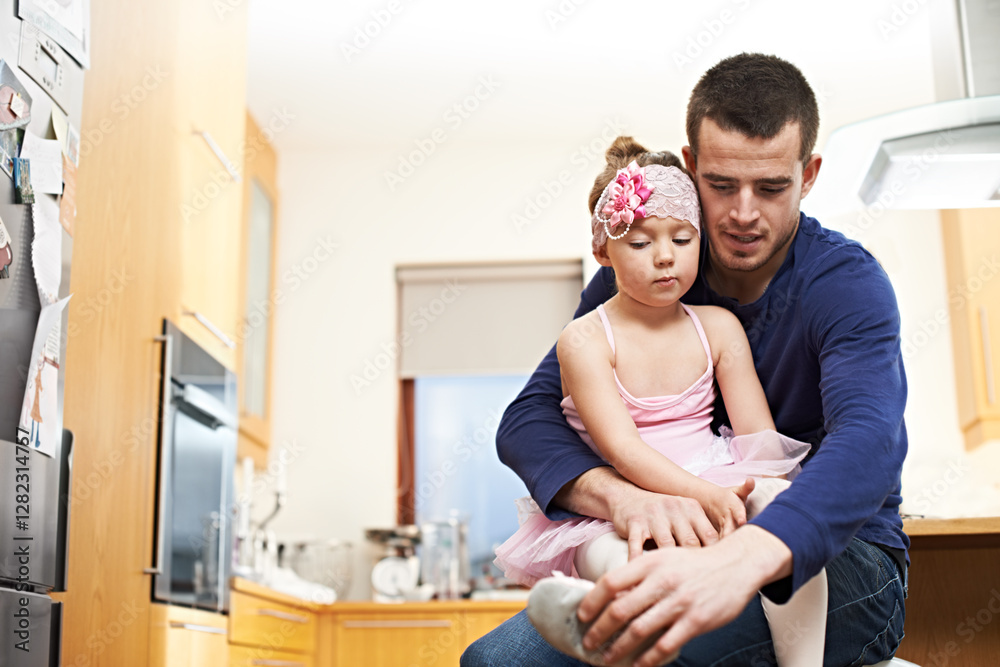Ballet, help and shoes with father and daughter in kitchen for dance practice, support or bonding. Ballerina, child development and growth with man and young girl in family home for love and dressing Ballet, help and shoes with father and daughter in kitchen for dance practice, support or bonding. Ballerina, child development and growth with man and young girl in family home for love and dressing