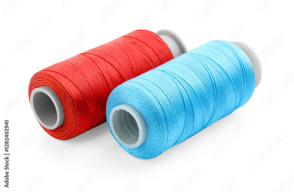 Spools of bright sewing threads isolated on white Spools of bright sewing threads isolated on white