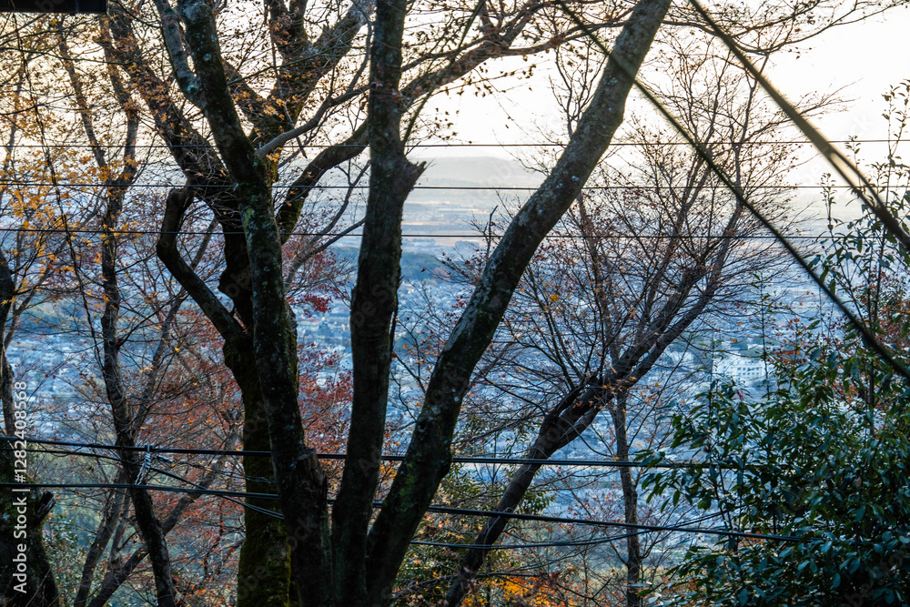 a view of the sunset over Kyoto, Japan a view of the sunset over Kyoto, Japan