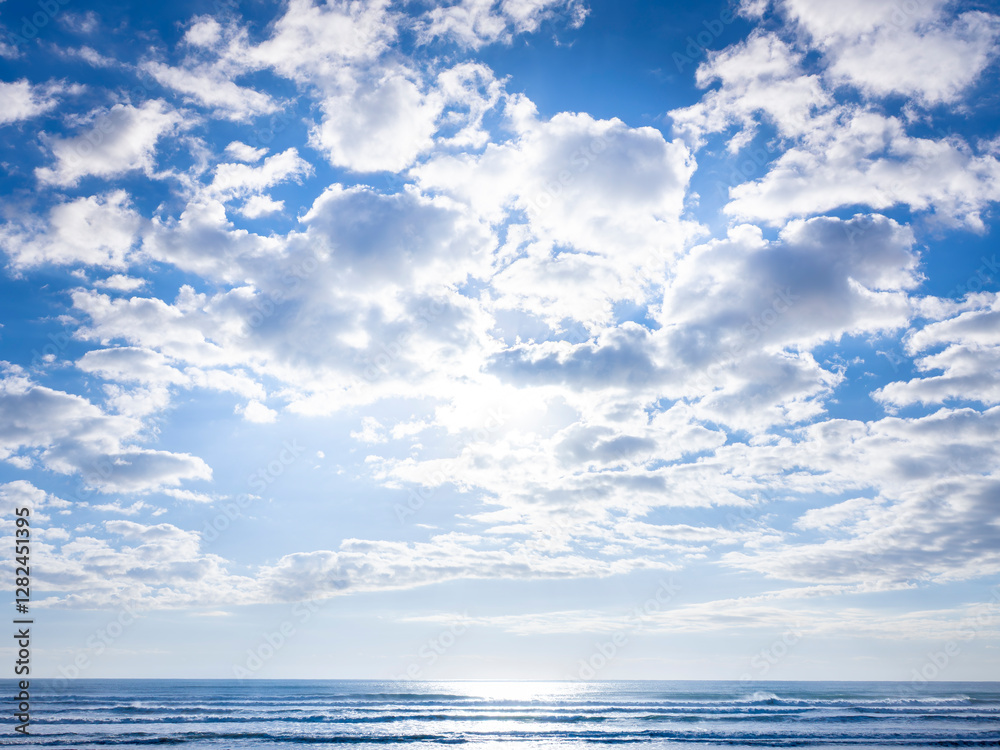 朝の海岸から見る青い空と白い雲 / Blue sky and white clouds seen from the morning beach 朝の海岸から見る青い空と白い雲 / Blue sky and white clouds seen from the morning beach