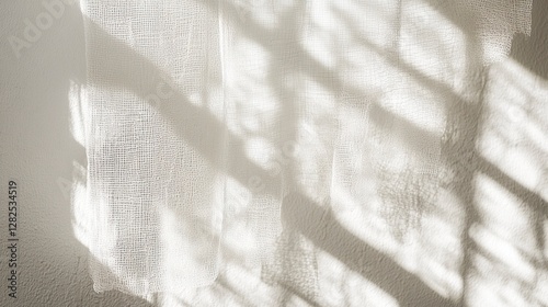 Abstract background with the shadow of a net on a white wall, with light and soft tones, in a minimalistic style, focusing on texture and shape, with clear edges for text or product display,