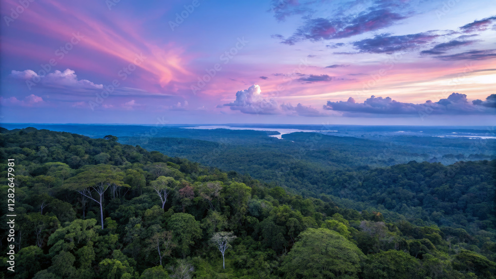 Fototapeta premium Breathtaking sunset over lush rainforest with vibrant colors and clouds