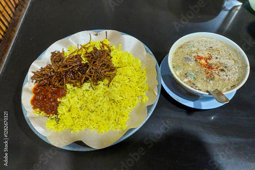 Food Indonesia Yellow rice and Coto Makassar ready to eat