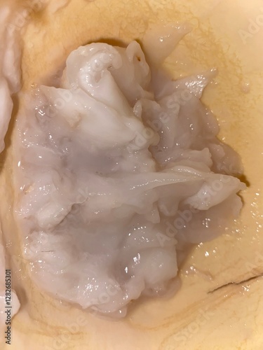 The flesh of young coconuts is white and soft