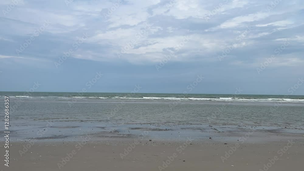Sea waves on the sand beach. Beautiful sunny day view to summer
Sea waves on the sand beach. Beautiful sunny day view to summer