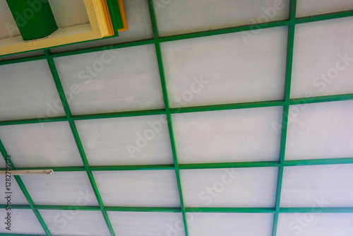 The mosque's ceiling is elegant white