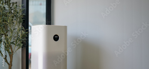 clean indoor space with an air purifier in the corner, promoting good air quality and overall cleanliness 
