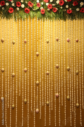 simple yellow theme stage decor designed with jasmine and lotus flowers
