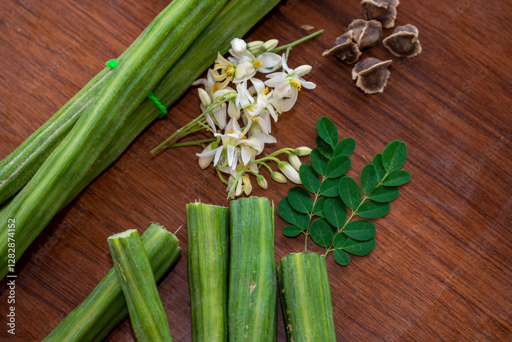 Moringa oleifera, Moringa leaves, Moringa flower, Moringa seed on wood background
