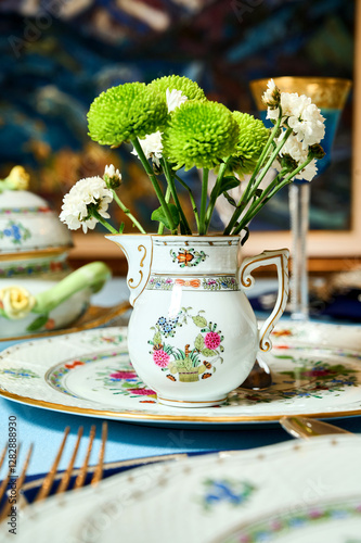 Vintage bicentennial porcelain in excellent condition with handmade spring flowers. Magnificent spring setting Herend photo