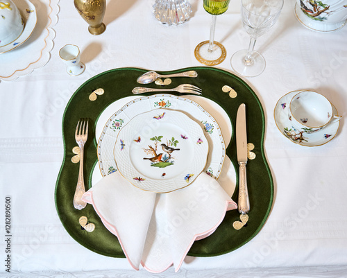 Fine vintage Rothschild Bird porcelain for true connoisseurs and royalty. The finest hand-painted forforework. Magnificent setting using unique textiles and fresh flowers. This service will not leave 