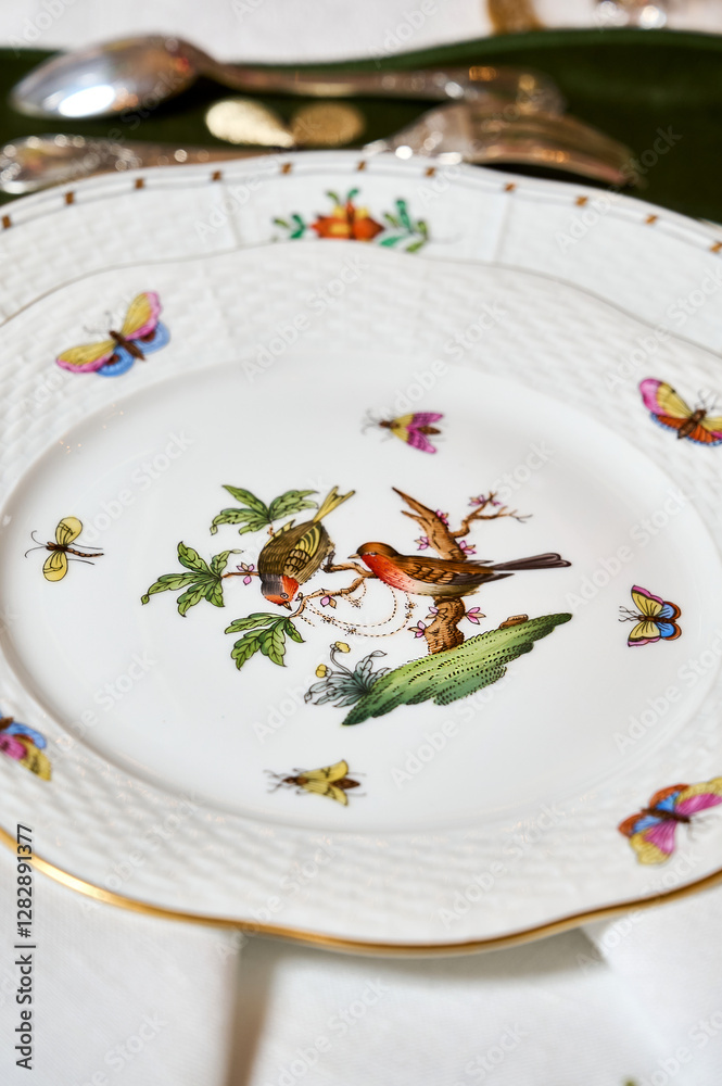 Fine vintage Rothschild Bird porcelain for true connoisseurs and royalty. The finest hand-painted forforework. Magnificent setting using unique textiles and fresh flowers. This service will not leave