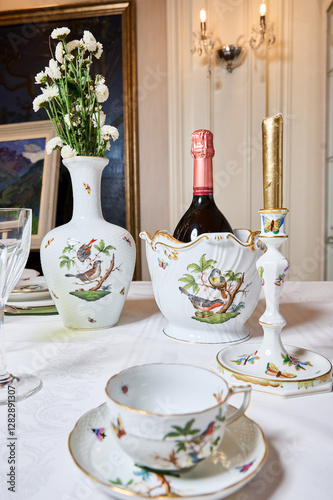 Fine vintage Rothschild Bird porcelain for true connoisseurs and royalty. The finest hand-painted forforework. Magnificent setting using unique textiles and fresh flowers. This service will not leave 