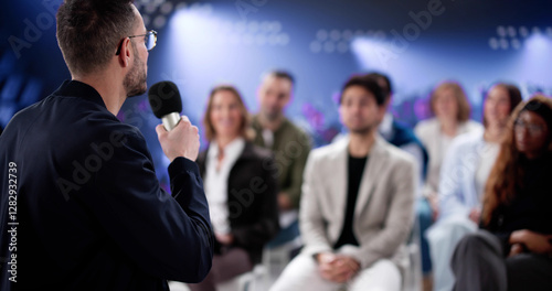 Engaging Speaker Captivates Diverse Audience at Business Conference Event