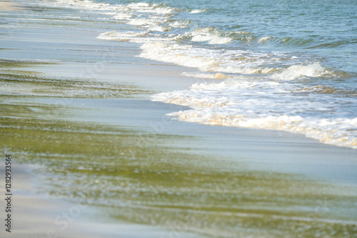 Fototapeta Naklejka Na Ścianę i Meble -  The sea water on the beach is a wave of various forms for background.