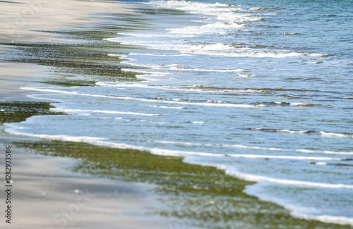 Fototapeta Naklejka Na Ścianę i Meble -  The sea water on the beach is a wave of various forms for background.