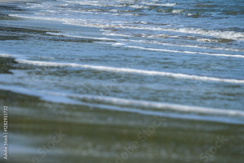 Fototapeta Naklejka Na Ścianę i Meble -  The sea water on the beach is a wave of various forms for background.