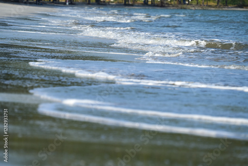 Fototapeta Naklejka Na Ścianę i Meble -  The sea water on the beach is a wave of various forms for background.