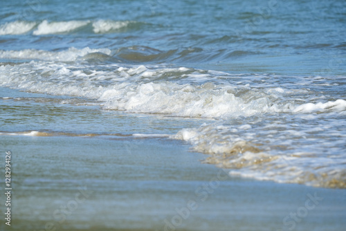 Fototapeta Naklejka Na Ścianę i Meble -  The sea water on the beach is a wave of various forms for background.