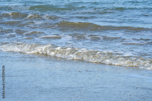 Fototapeta Naklejka Na Ścianę i Meble -  The sea water on the beach is a wave of various forms for background.