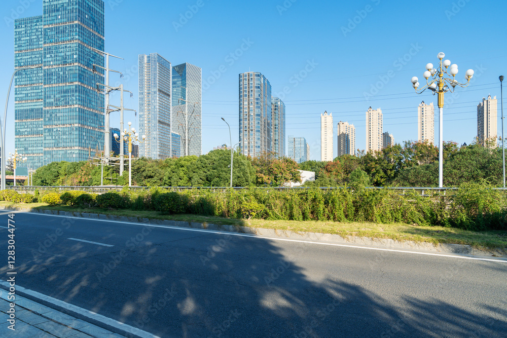 Obraz premium Empty urban road and buildings in the city