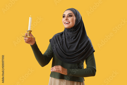Young Muslim woman with bur...