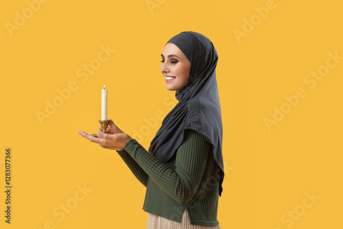 Young Muslim woman with bur...