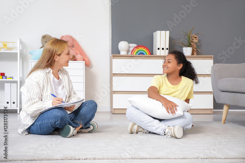 Female psychologist working...