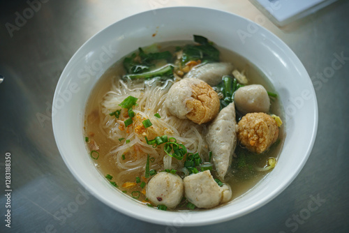 Fish line in white bowl, Fish ball noodle soup recipe. Top view